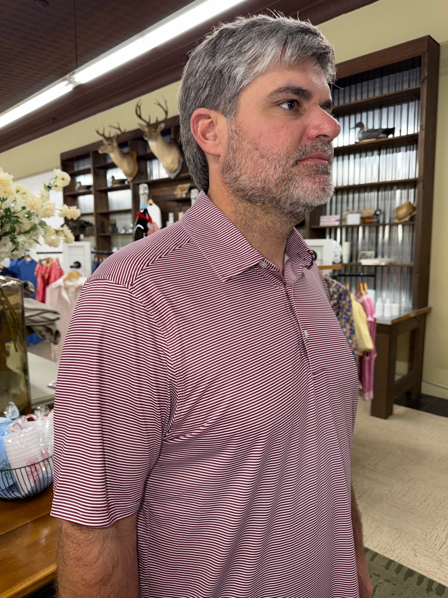 The Gameday Performance Polo in Maroon and White